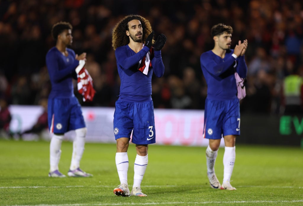 Marc Cucurella of Chelsea applauds the fans