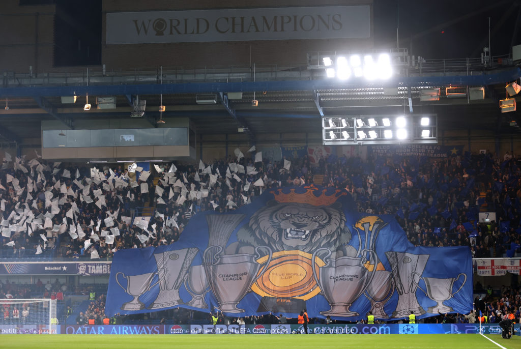 Chelsea fans hold up a banner before the Champions League match against Benfica.