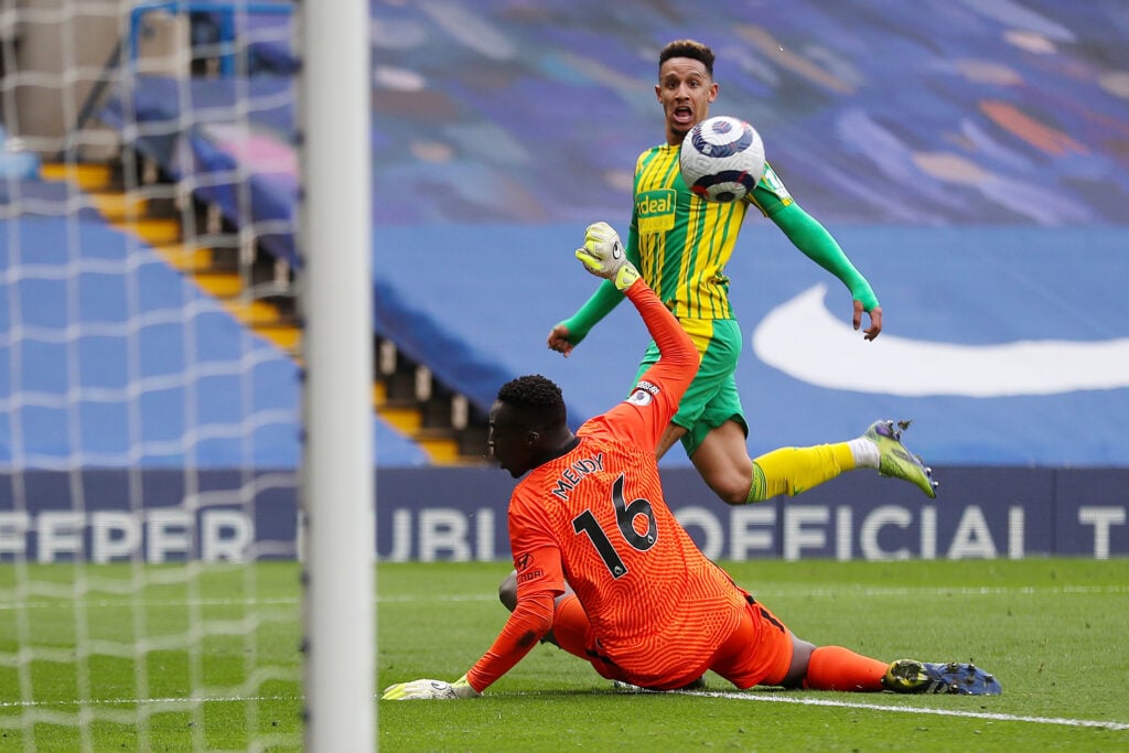 West Brom striker Callum Robinson scores against Chelsea