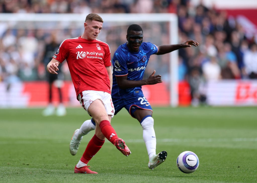 Nottingham Forest's Elliot Anderson competes with Chelsea's Moises Caicedo for possession in the Premier League match.