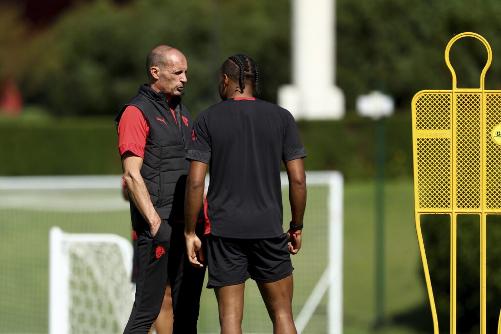 Massimiliano Allegri and Christopher Nkunku in AC Milan training