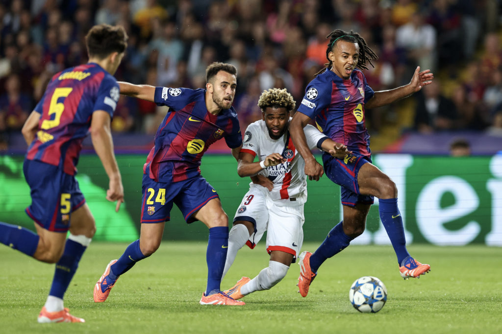 Ibrahim Mbaye battles for the ball with Eric Garcia and Jules Kounde