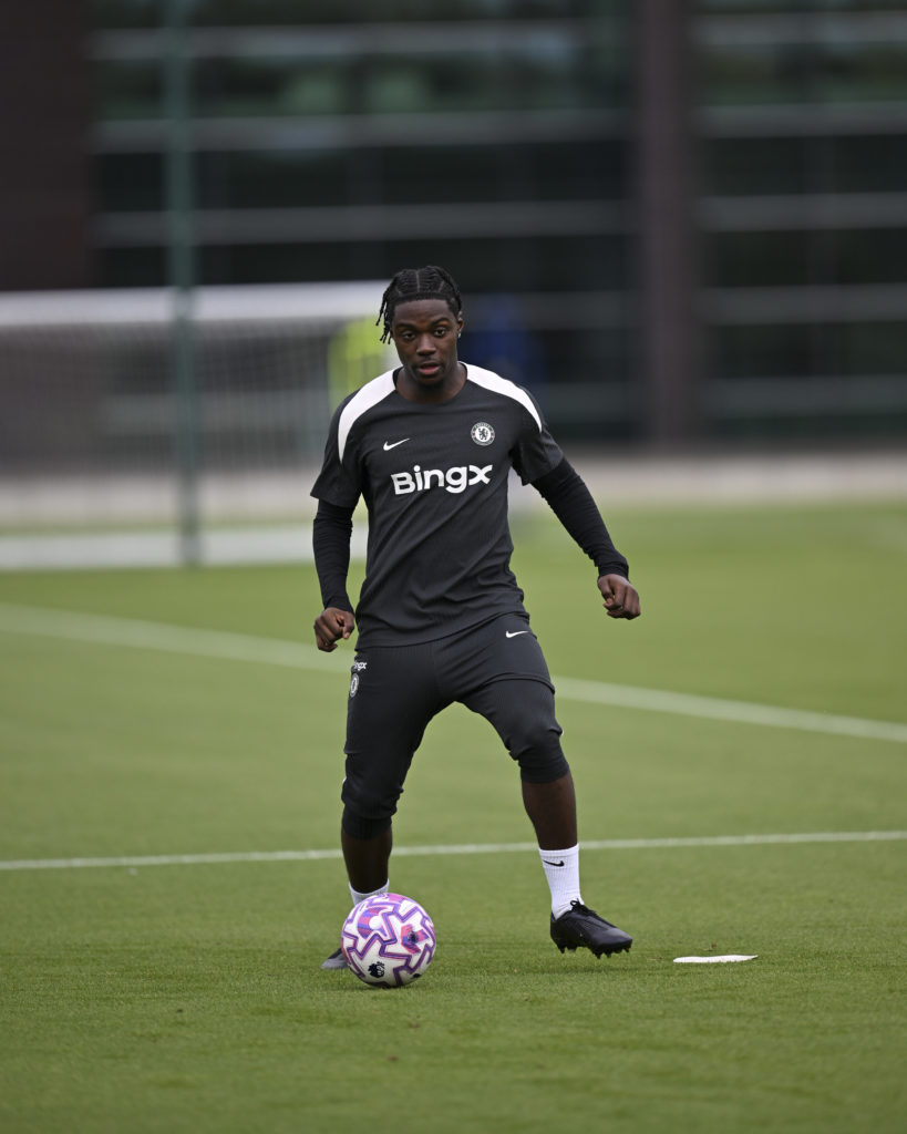 Romeo Lavia in a Chelsea training session on the grass at Cobham.