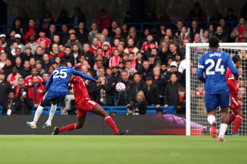 Moises Caicedo of Chelsea scores his team's first goal during the Premier League match between Chelsea and Liverpool