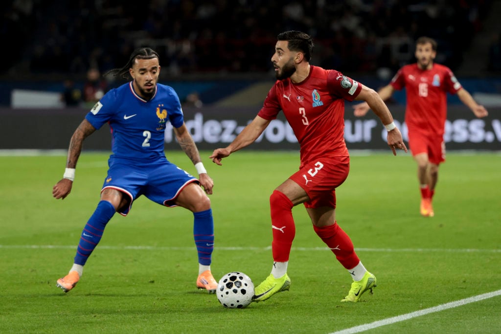 Chelsea's Malo Gusto defending for France against Azerbaijan in a FIFA World Cup 2026 qualifier.