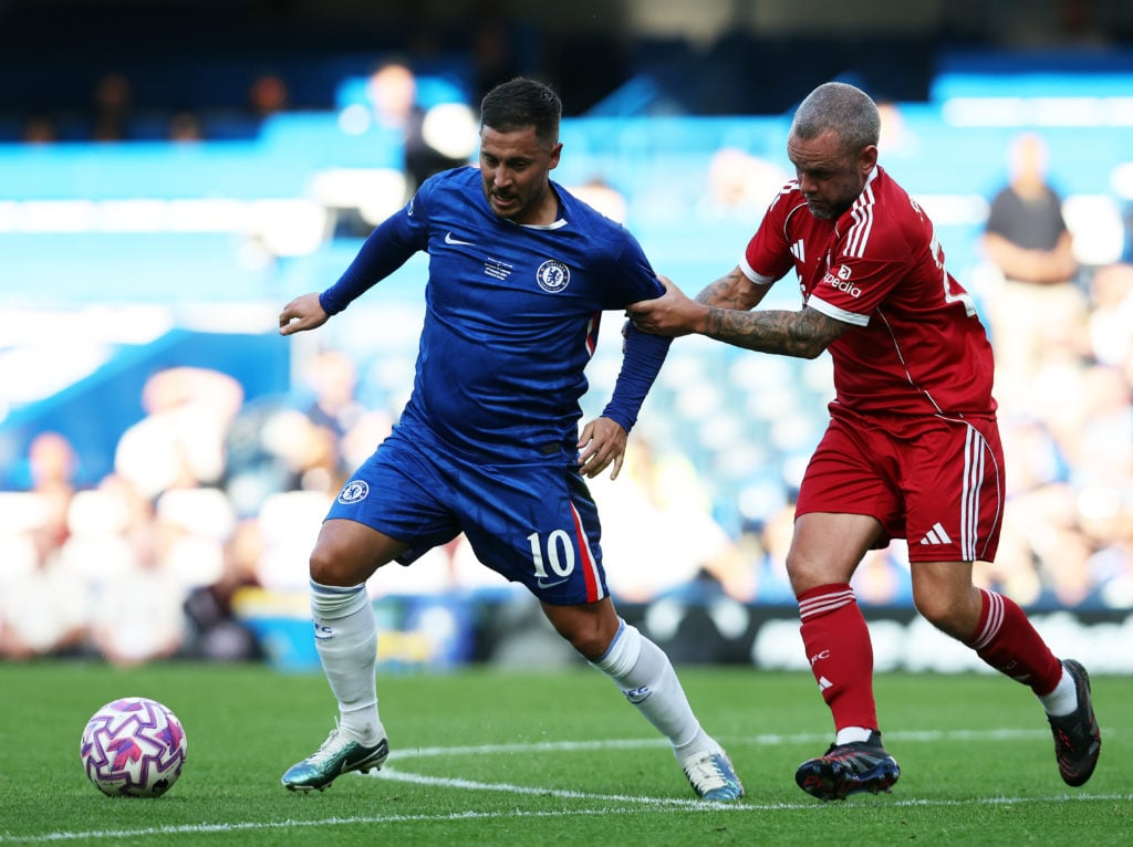 Eden Hazard dribbles away from Raheem Sterling during Chelsea Legends against Liverpool Legends at Stamford Bridge.
