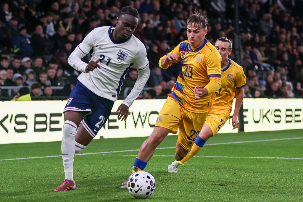 Tyrique George dribbling for England against Andorra in a qualifying match for the UEFA European Under-21 Championship.