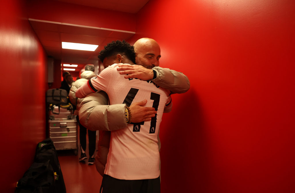 Chelsea manager Enzo Maresca hugging Estevao Willian