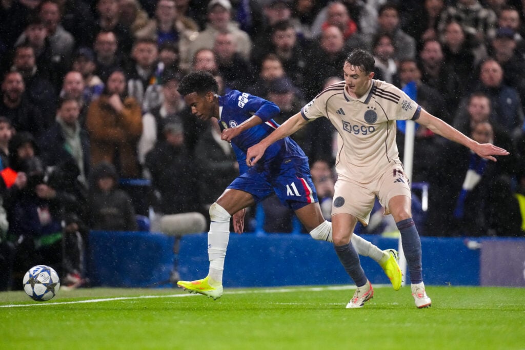 Chelsea star Estevao Willian battling with Ajax's Youri Baas in the Champions League match at Stamford Bridge.