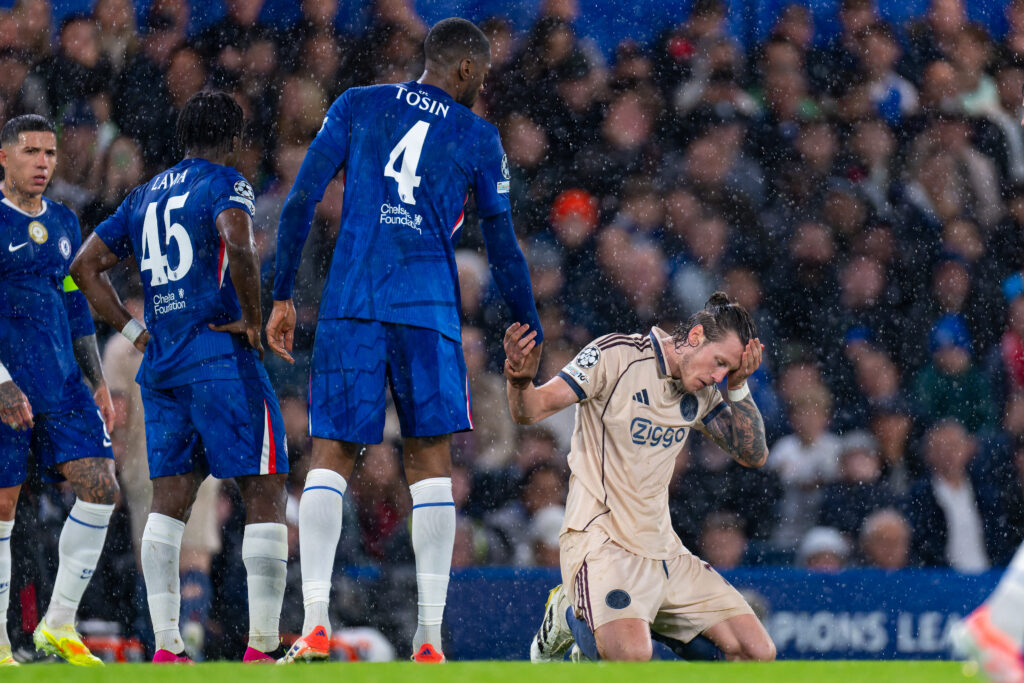 Tosin Adarabioyo picks up Wout Weghorst during Chelsea's Champions League match against Ajax.