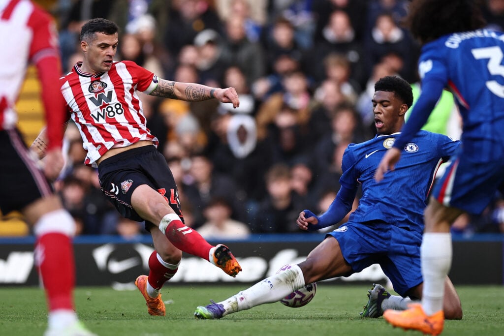 Josh Acheampong blocks Granit Xhaka's shot during Chelsea vs Sunderland
