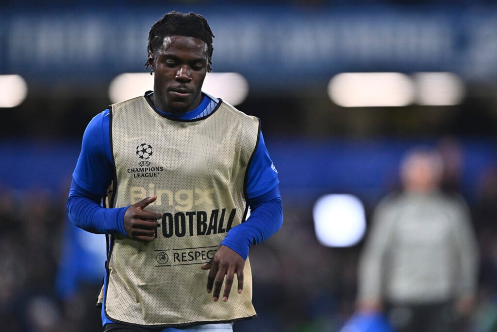 Romeo Lavia warms up during Chelsea vs Ajax
