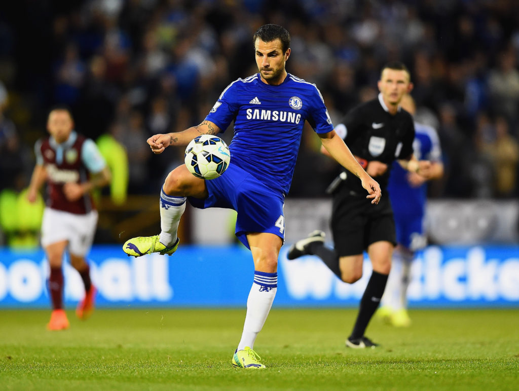 Cesc Fabregas playing for Chelsea against Burnley in the Premier League.