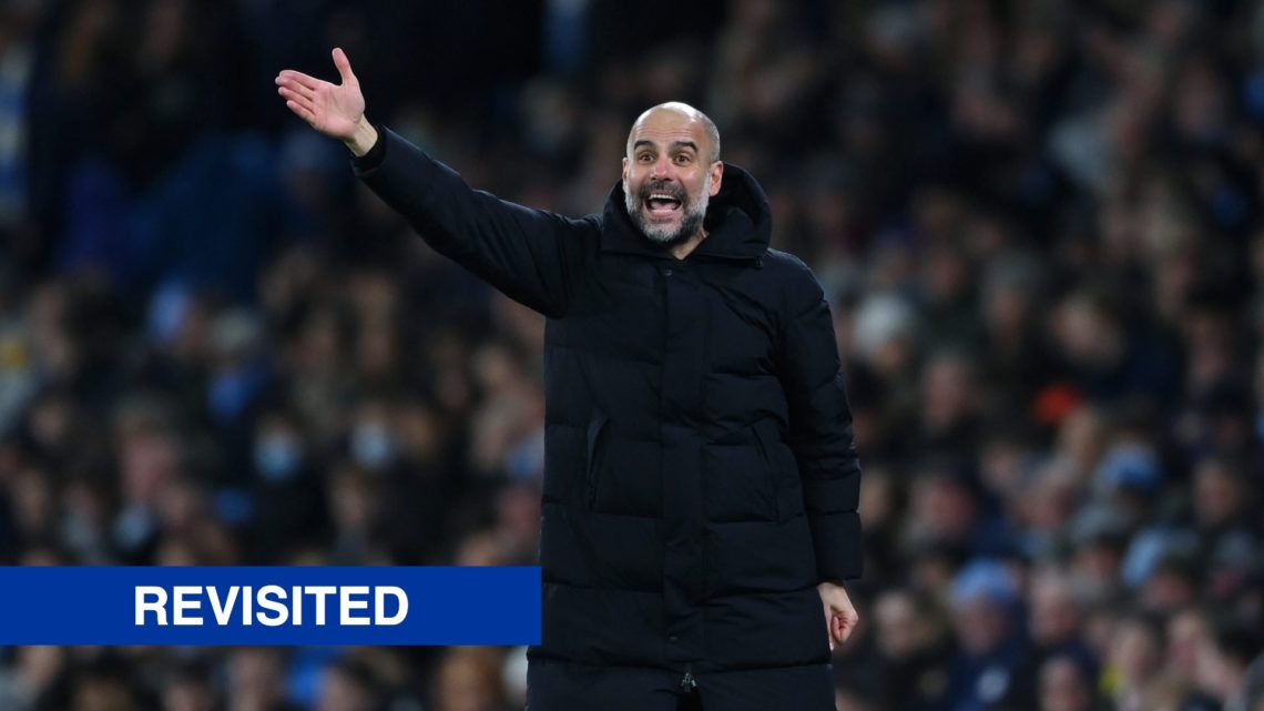Pep Guardiola puts his arm up during the Premier League match against Brentford.