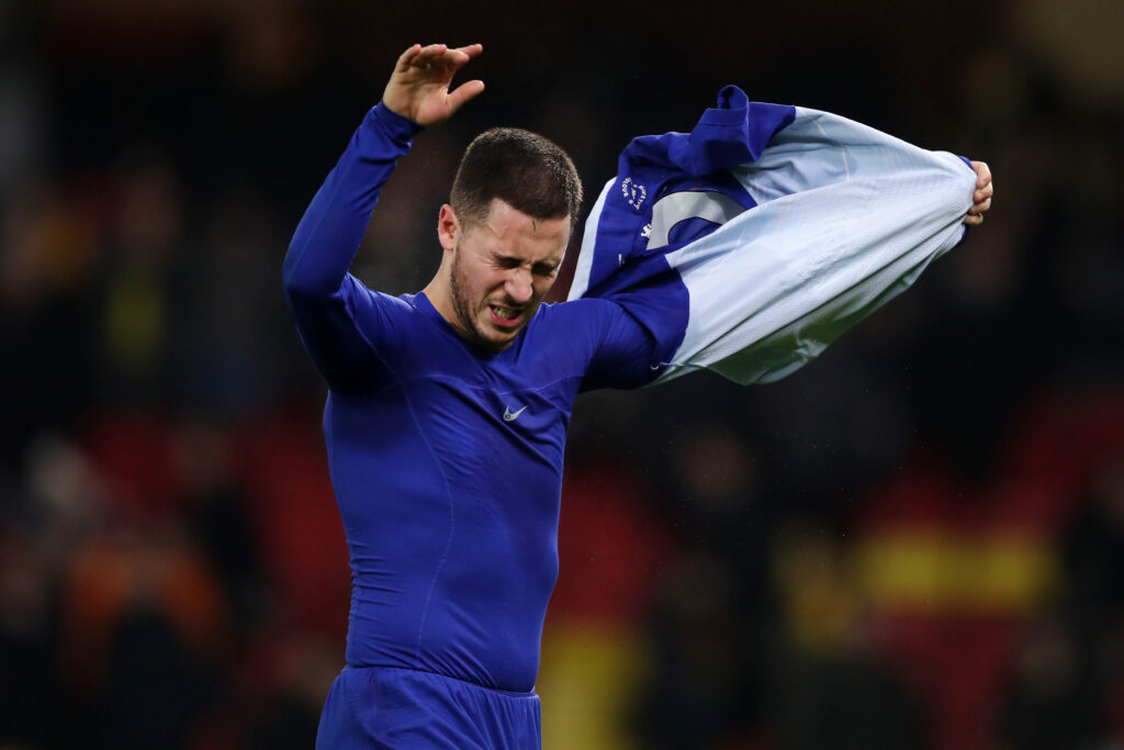Chelsea winger Eden Hazard takes off shirt