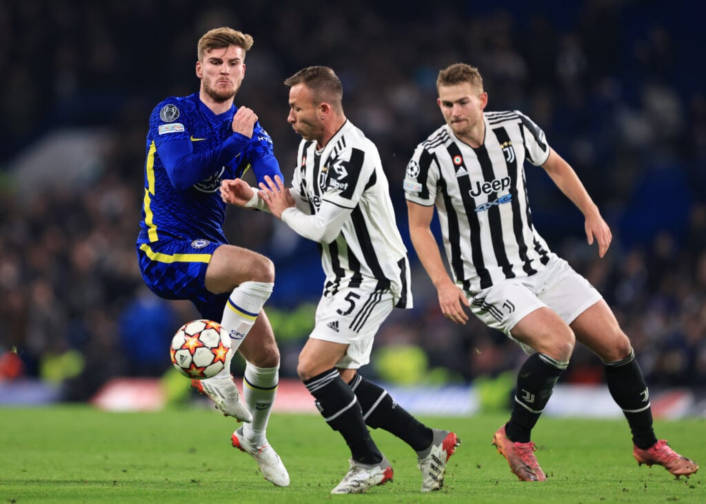 Timo Werner of Chelsea in action with Arthur and Matthijs de Ligt of Juventus