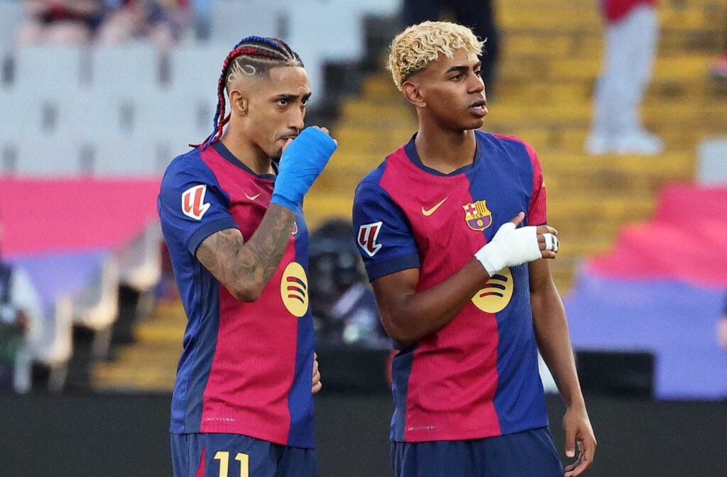 Barcelona duo Raphinha and Lamine Yamal talking