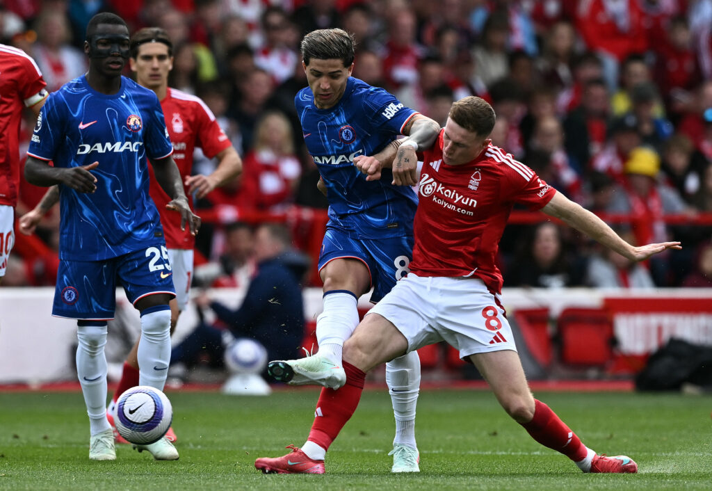 Chelsea midfielder Enzo Fernandez and Nottingham Forest midfielder Elliot Anderson contest for the ball