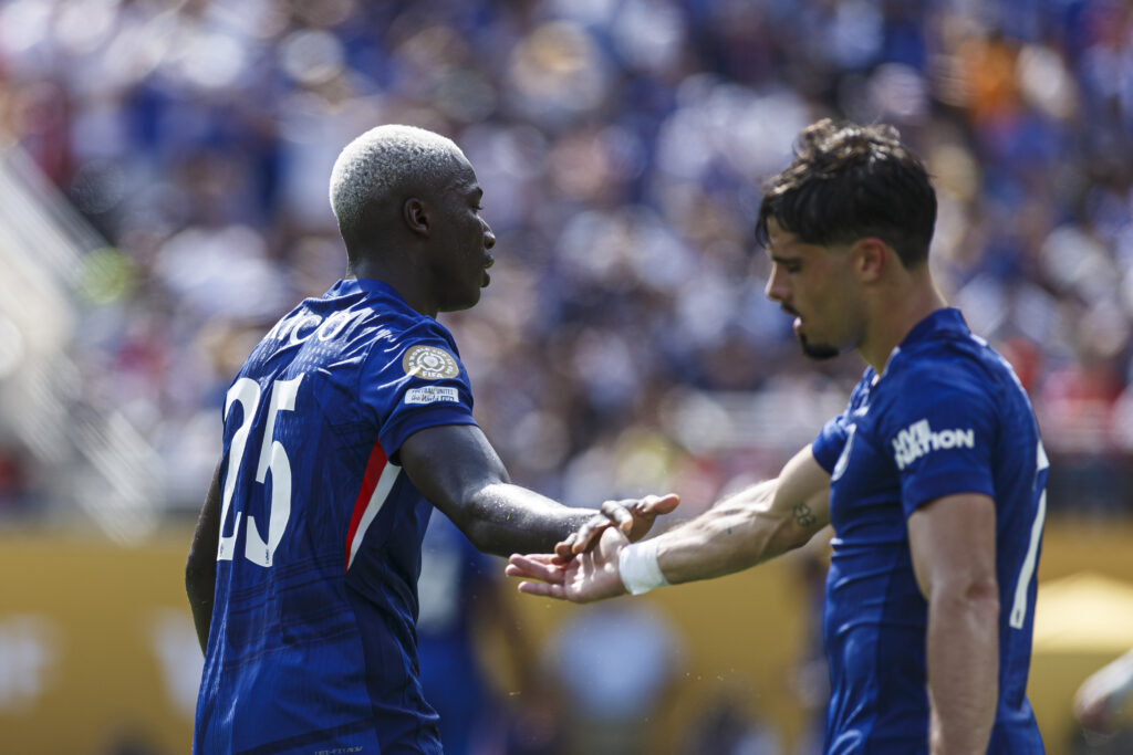 Chelsea duo Moises Caicedo and Pedro Neto shaking hands