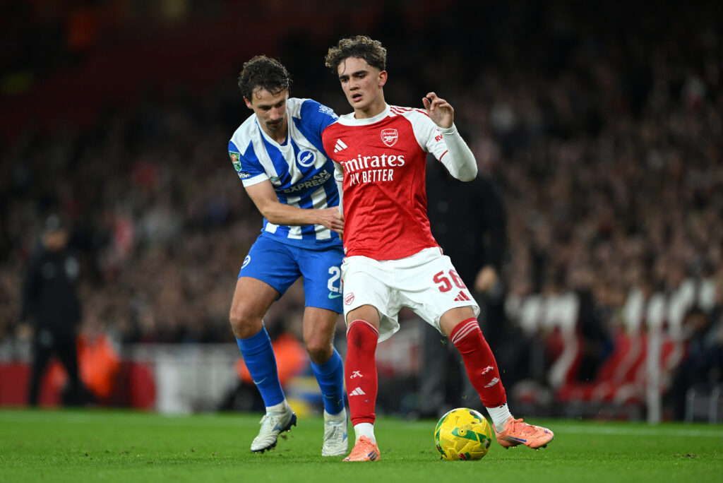 Max Dowman and Olivier Boscagli battle for the ball during Arsenal v Brighton & Hove Albion - Carabao Cup Fourth Round