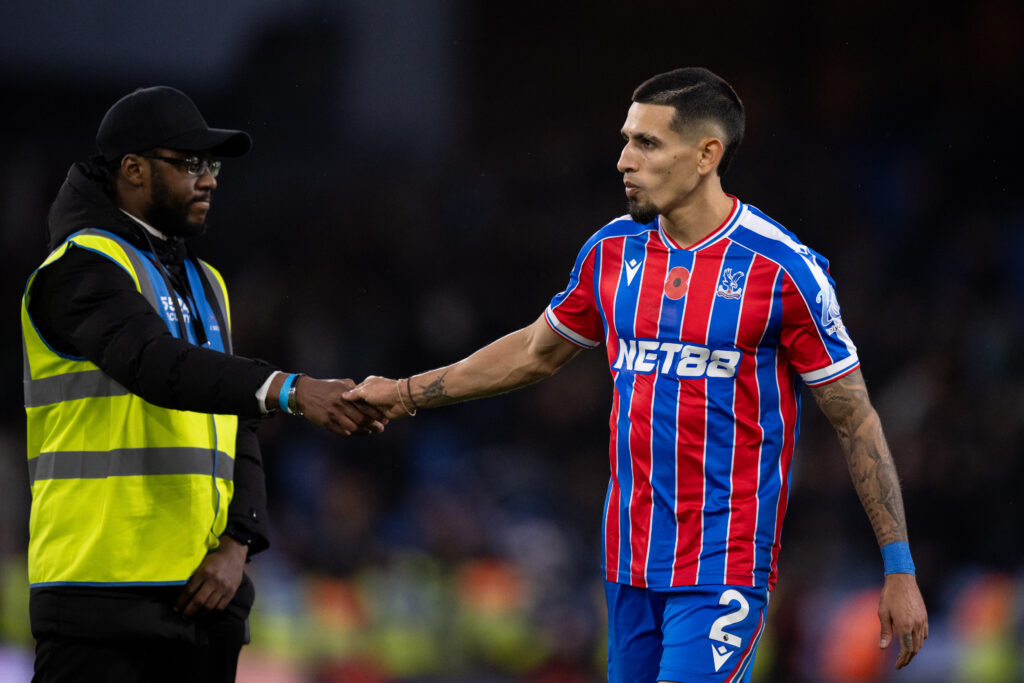 Crystal Palace defender Daniel Munoz shaking steward's hand