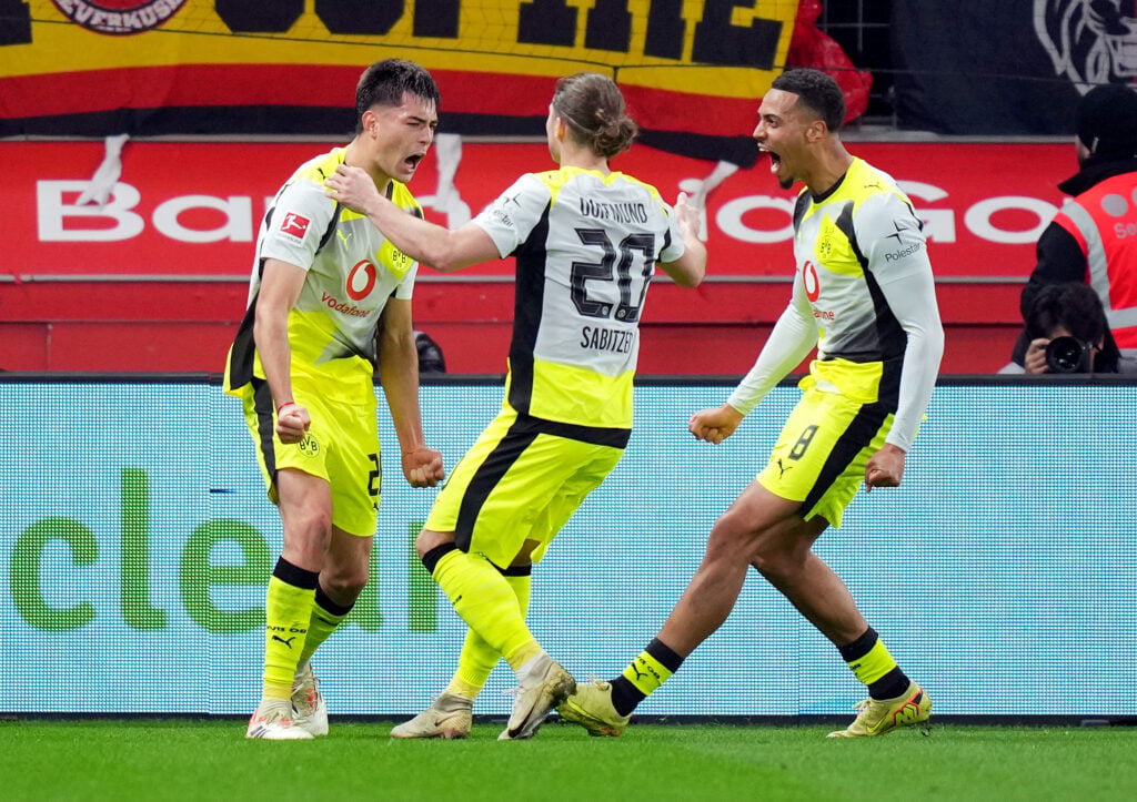 Aaron Anselmino of Borussia Dortmund celebrates scoring goal