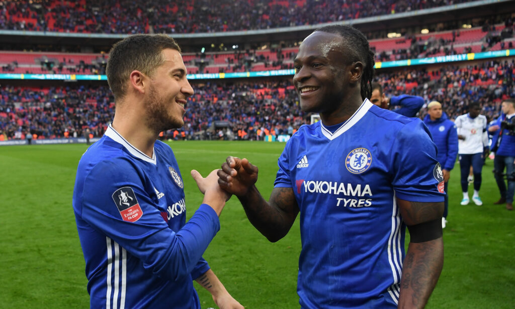 Chelsea teammates Eden Hazard and Victor Moses shaking hands