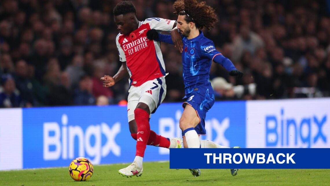 Arsenal winger Bukayo Saka trying to hold off Chelsea defender Marc Cucurella