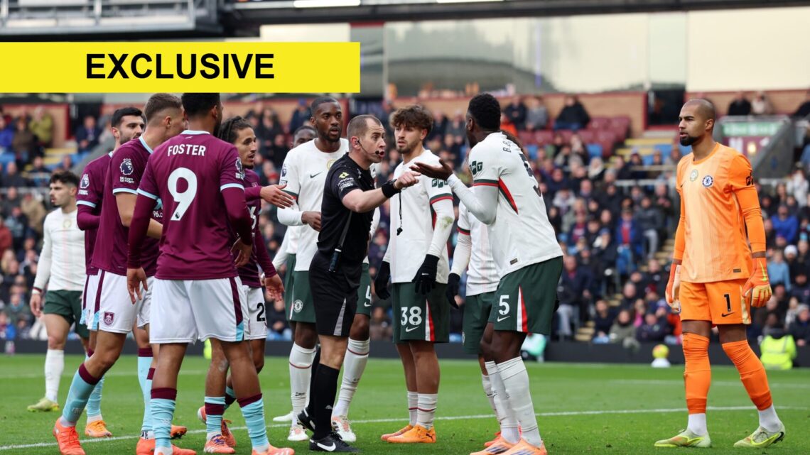 Peter Bankes shows a yellow card to Benoit Badiashile during Burnley v Chelsea - Premier League