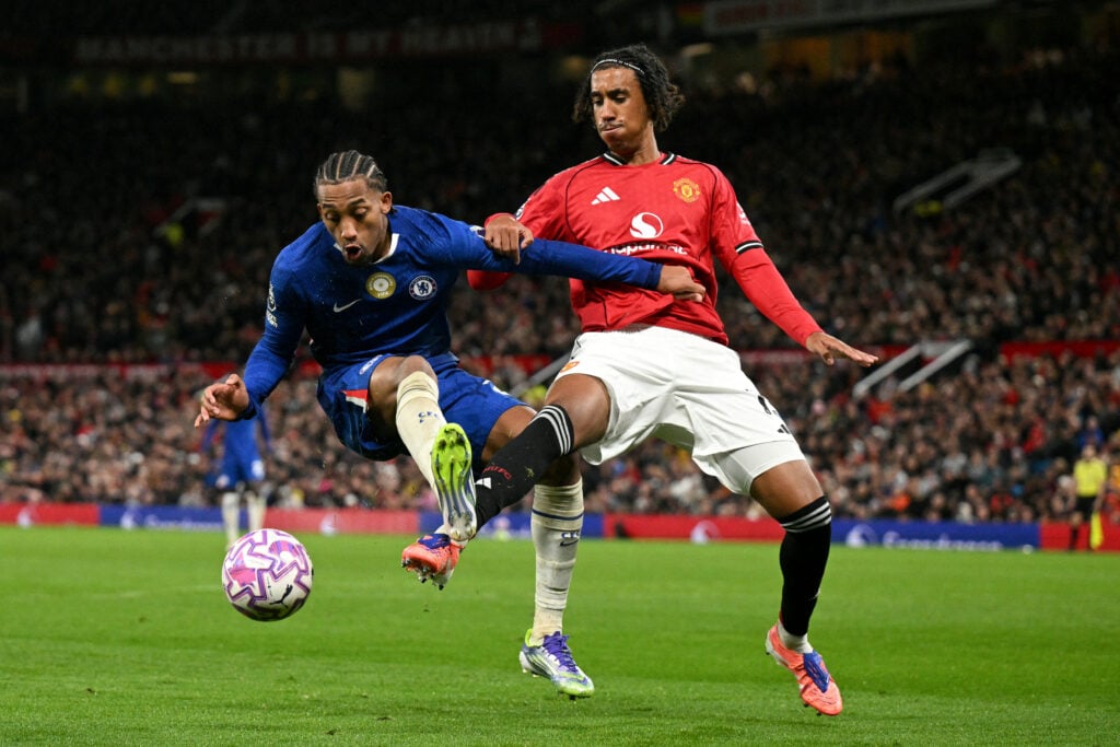 Chelsea's Brazilian striker Joao Pedro battles for the ball with Manchester United's French defender Leny Yoro