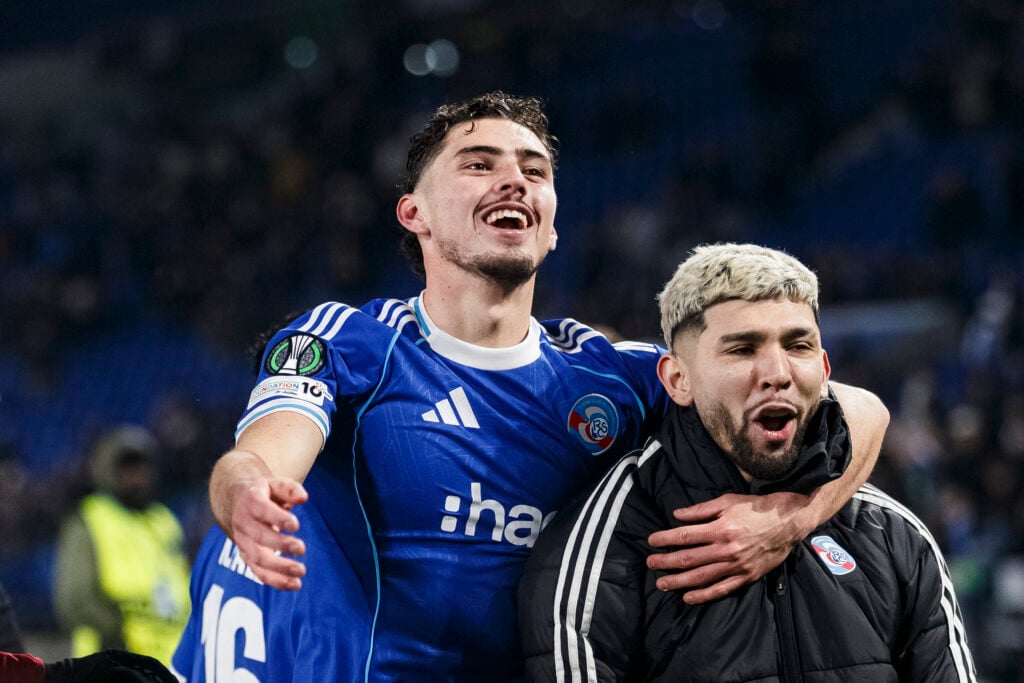 Joaquín Panichelli of Strasbourg (L) and Julio Enciso (R) celebrate