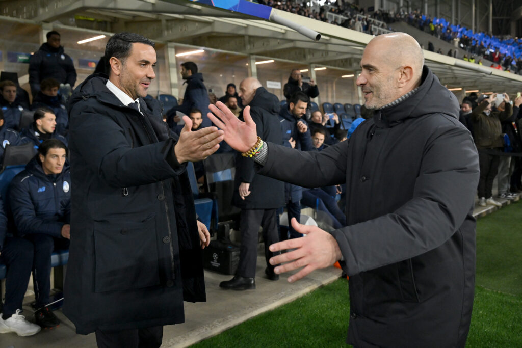 Raffaele Palladino, Head Coach of Atalanta, and Enzo Maresca, Manager of Chelsea, interact