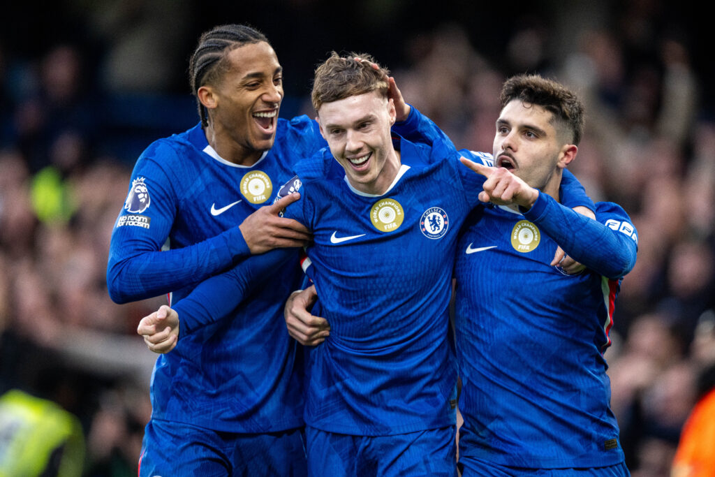 Cole Palmer celebrating with Pedro Neto and Joao Pedro for Chelsea vs Everton