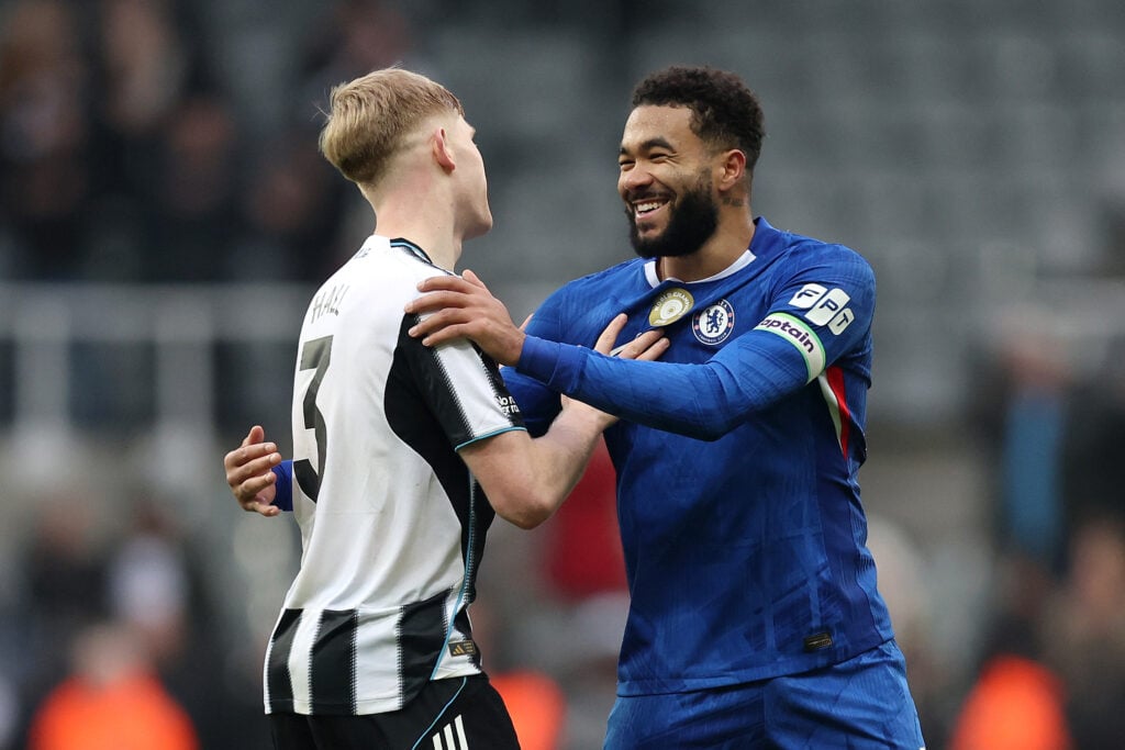 Reece James and Lewis Hall embrace after Chelsea vs Newcastle