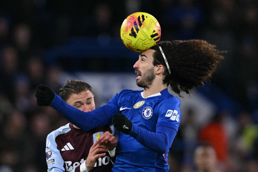 Marc Cucurella heads the ball for Chelsea