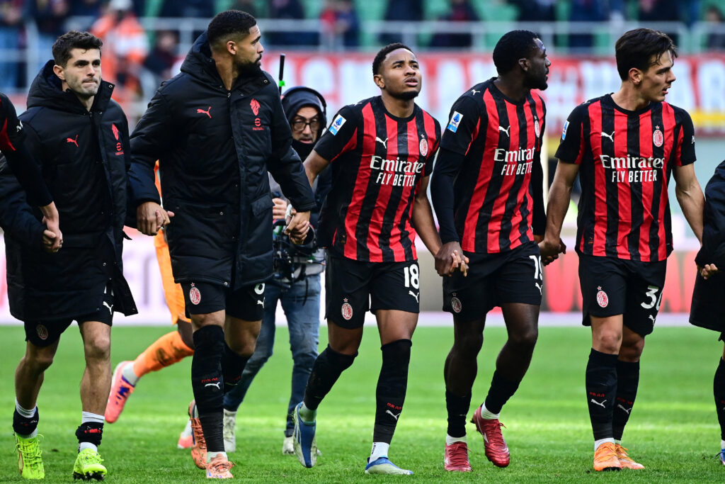 AC Milan players celebrating together