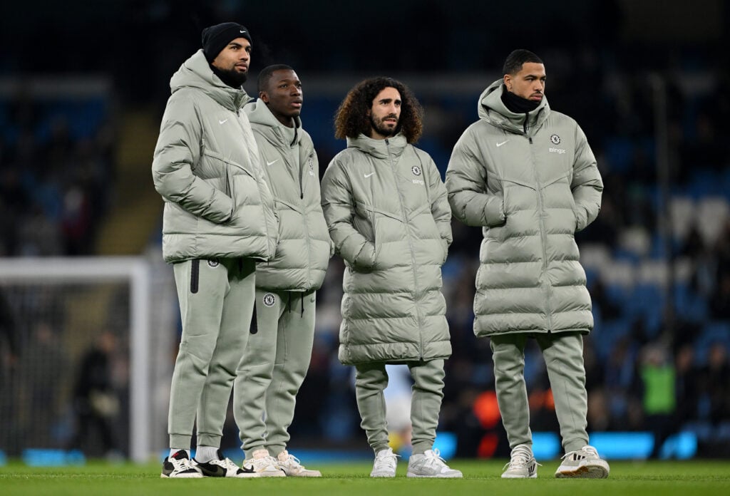 Levi Colwill, Robert Sanchez, Marc Cucurella and Moises Caicedo look on ahead of Manchester City v Chelsea - Premier League