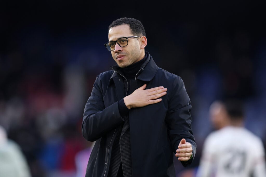 Liam Rosenior, Manager of Chelsea, acknowledges the fans