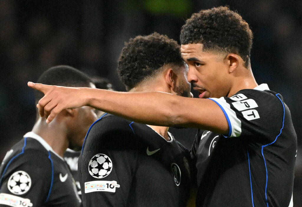 Chelsea's French defender #29 Wesley Fofana (R) speaks to Chelsea's English defender #24 Reece James
