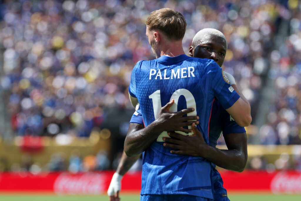 Chelsea midfielder Cole Palmer (10) is hugged by teammate Chelsea midfielder Moisés Caicedo