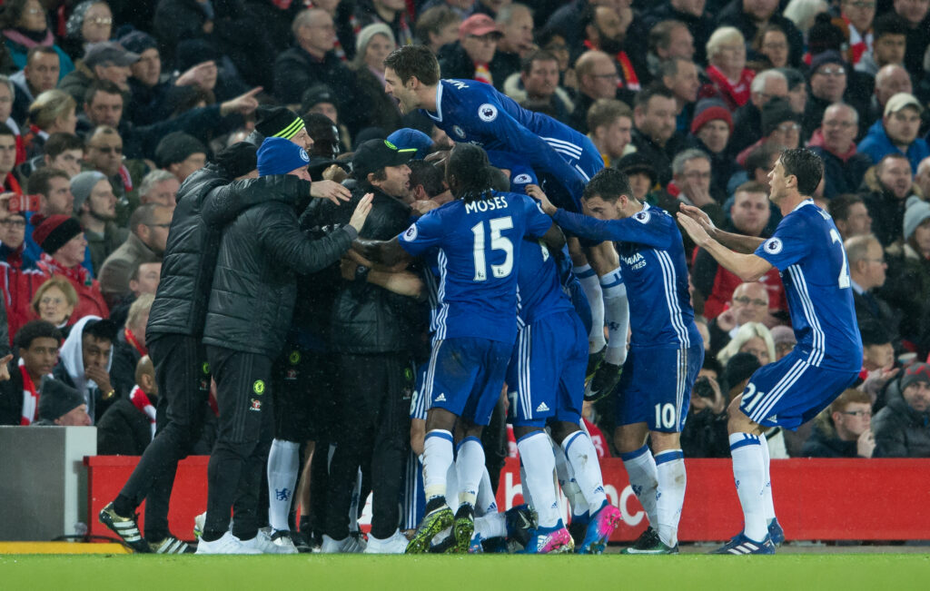 Chelsea players celebrating after scoring against Liverpool