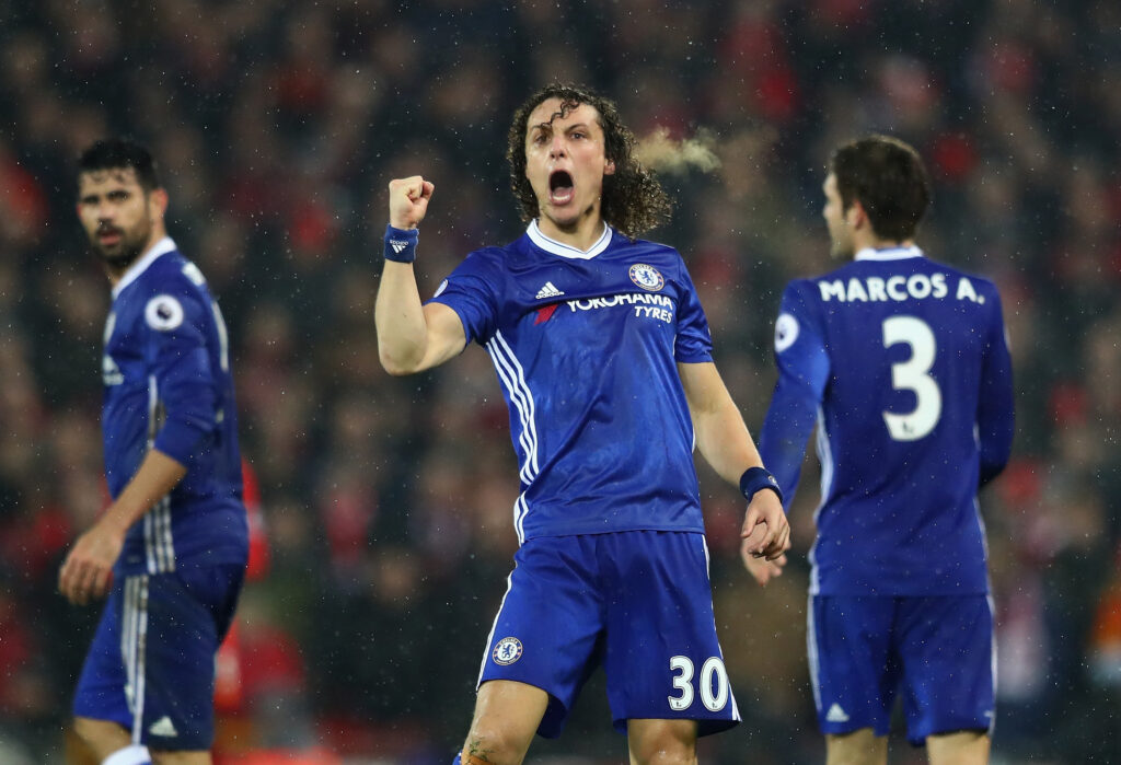 Chelsea defender David Luiz celebrating after scoring against Liverpool