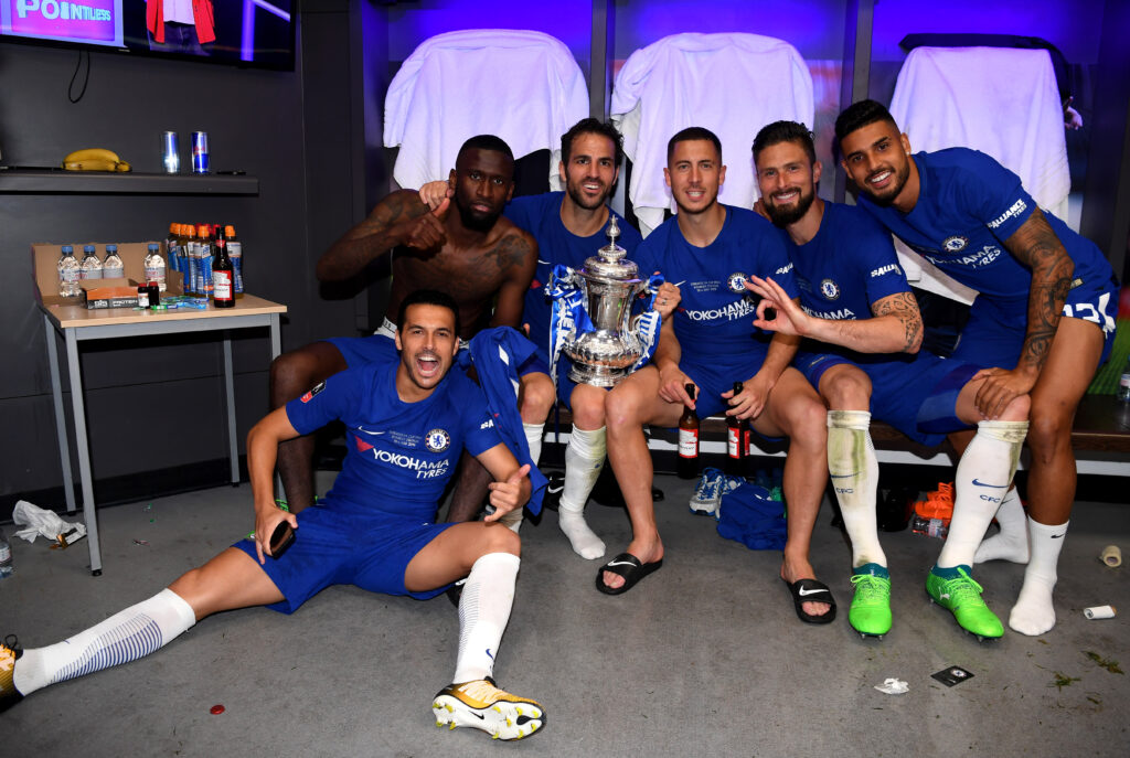 Chelsea players celebrate with FA Cup in dressing room after 2018 final
