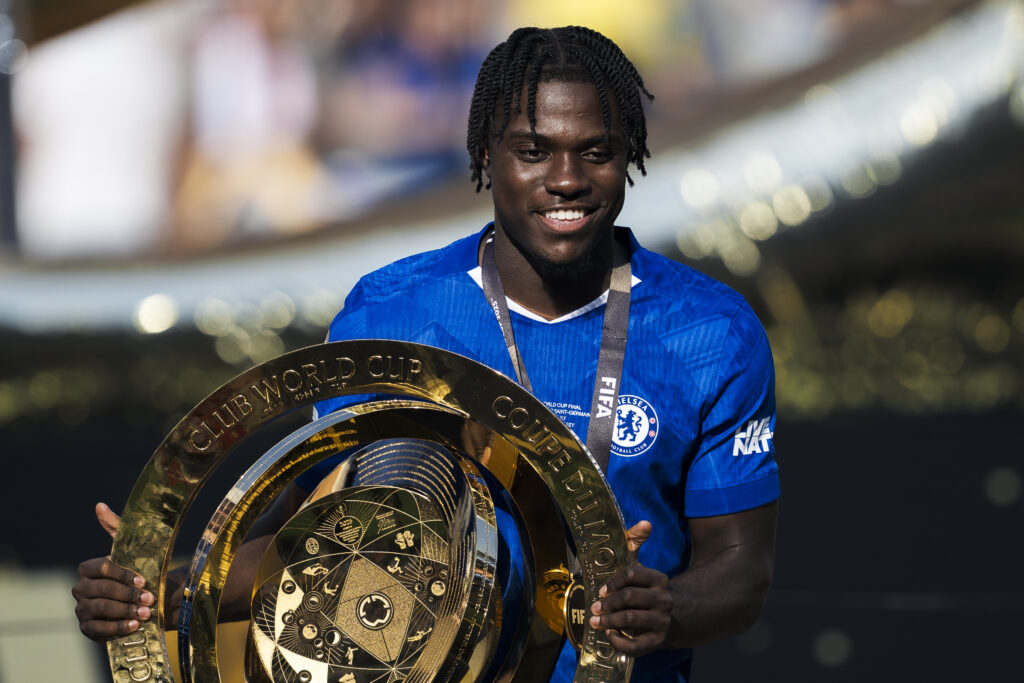 Romeo Lavia of Chelsea FC poses with the trophy
