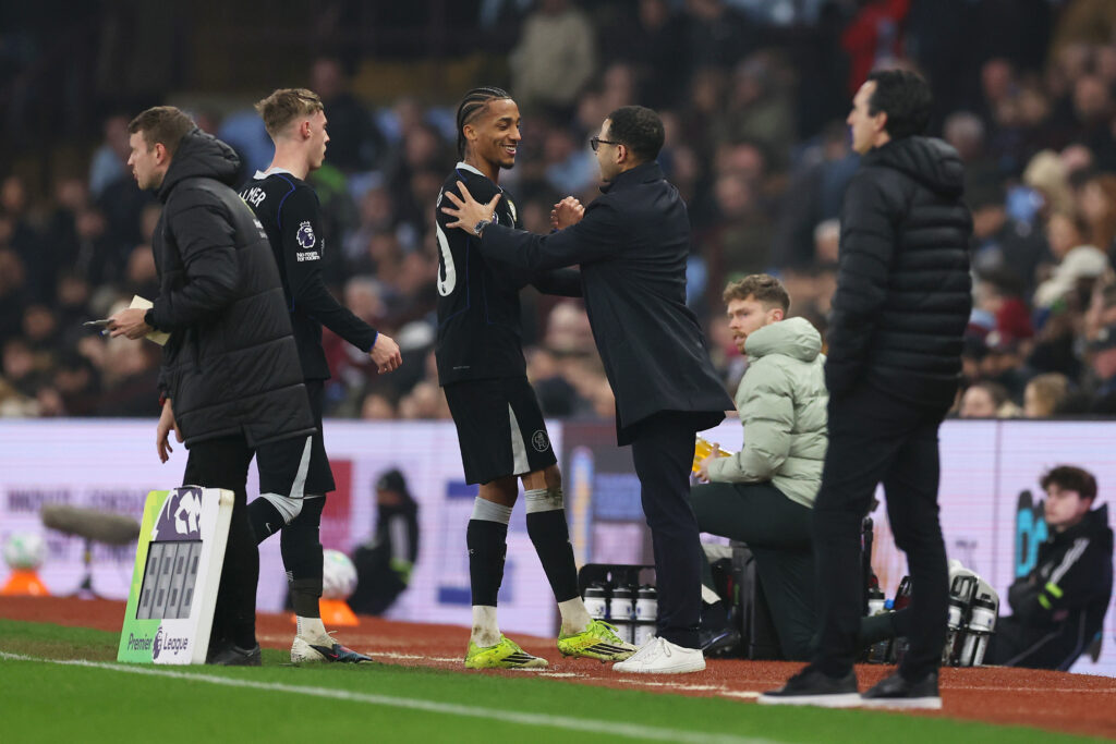 Liam Rosenior, Manager of Chelsea, congratulates Joao Pedro for scoring a hat-trick