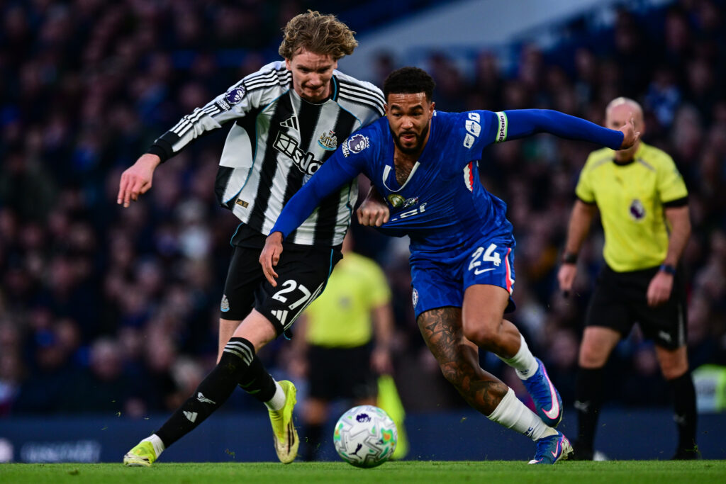 Nick Woltemade of Newcastle United (27) and Reece James of Chelsea FC (24) tussle