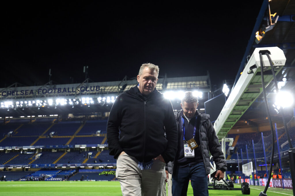 Chelsea owner Todd Boehly walks across the pitch after the UEFA Champions League 2025/26 Round of 16 Second Leg match between Chelsea FC and Paris Saint-Germain FC at Stamford Bridge on March 17, 2026 in London, United Kingdom.