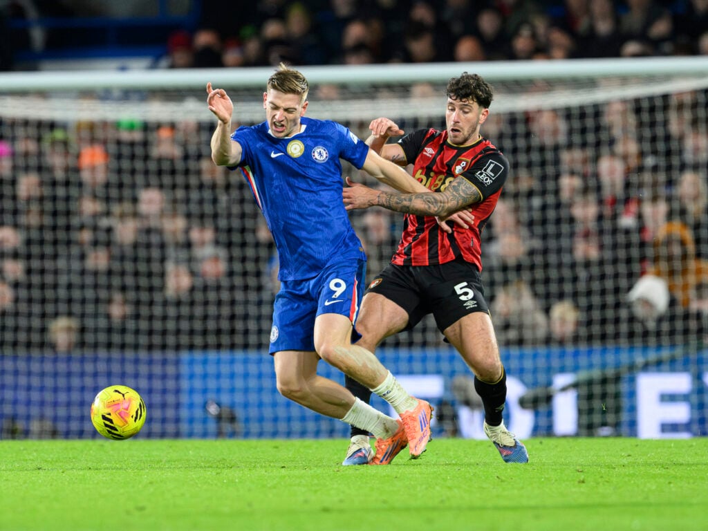 Bournemouth's Marcos Senesi (right) battles with Chelsea's Liam Delap (left)