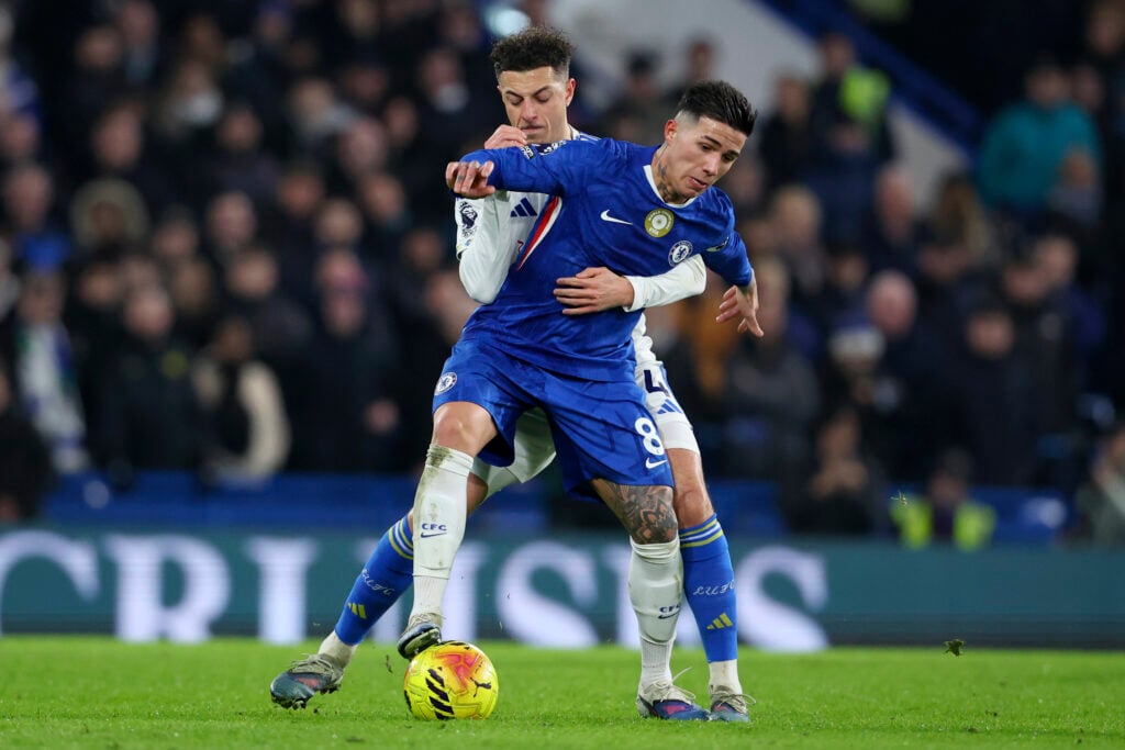 Ethan Ampadu of Leeds United and Enzo Fernandez of Chelsea challenge during the Premier League match between Chelsea and Leeds United