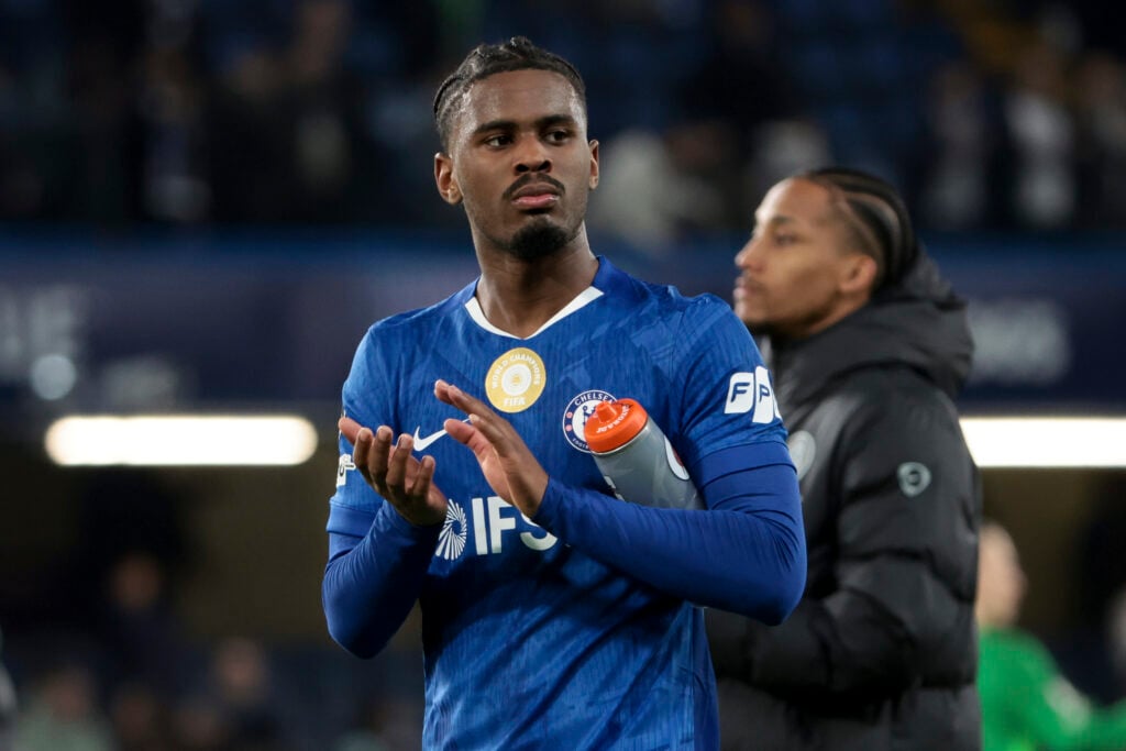 Jorrel Hato of Chelsea salutes the supporters